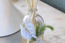 DIY oil reed diffuser with a fresh rosemary scent