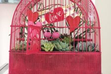DIY pink love bird succulent planter as a centerpiece