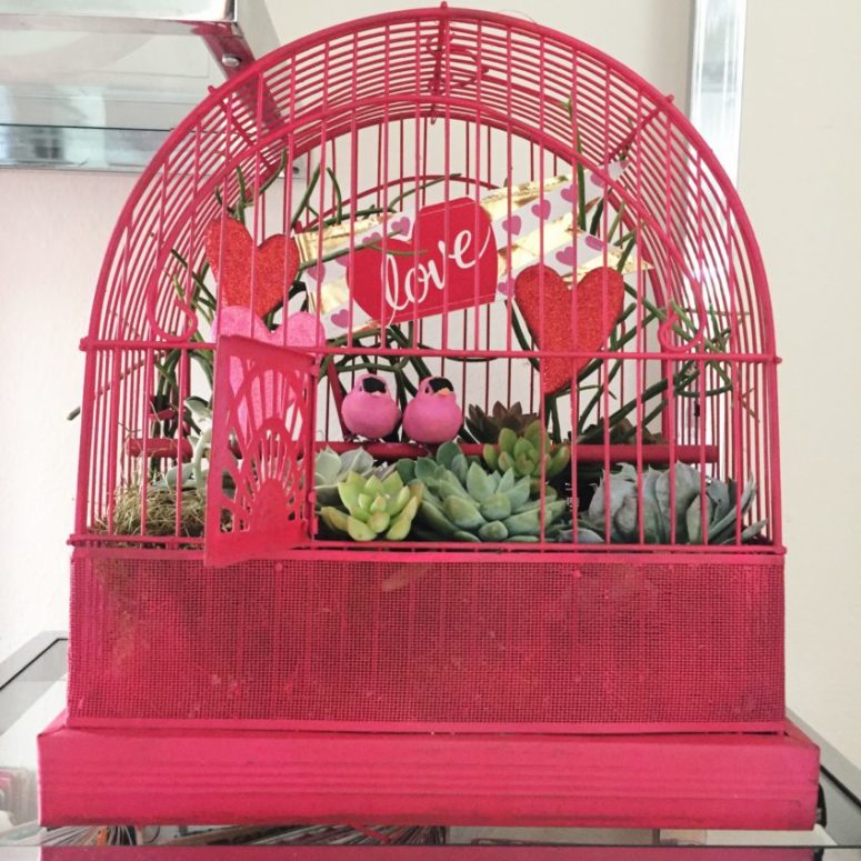 DIY pink love bird succulent planter as a centerpiece (via jenniferperkins.com)