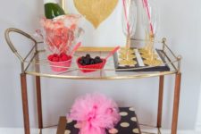 glitter touches, a glitter heart sign and some petals and hearts make this cart Valentine-like