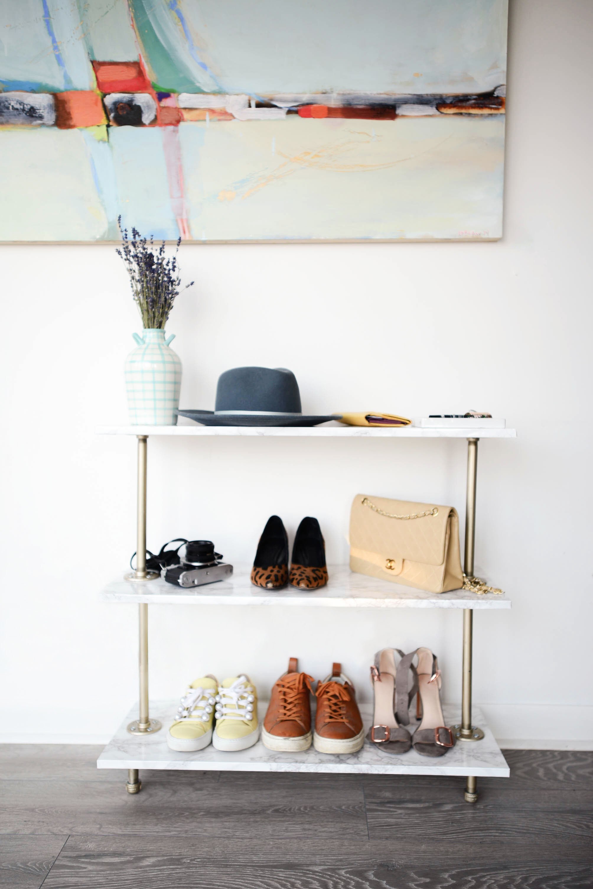 DIY marble contact paper and piping shoe rack  (via threadsandblooms.com)