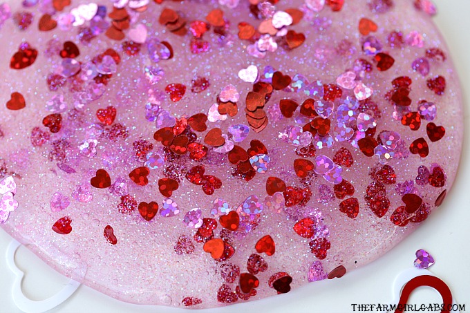 DIY sheer pink slime with hearts and glitter (via thefarmgirlgabs.com)
