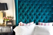 02 a bold turquoise tufted wingback headboard makes a statement in your bedroom with its look and color