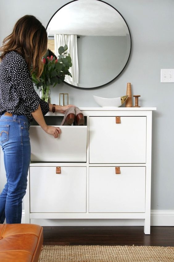 a chic and simple IKEA Hemnes cabinet hack with leather pulls is a cool way to spruce up a simple storage piece