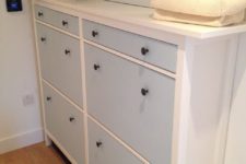 05 a cute IKEA Hemnes shoe storage in light blue with black knobs is ideal for a kids’ space