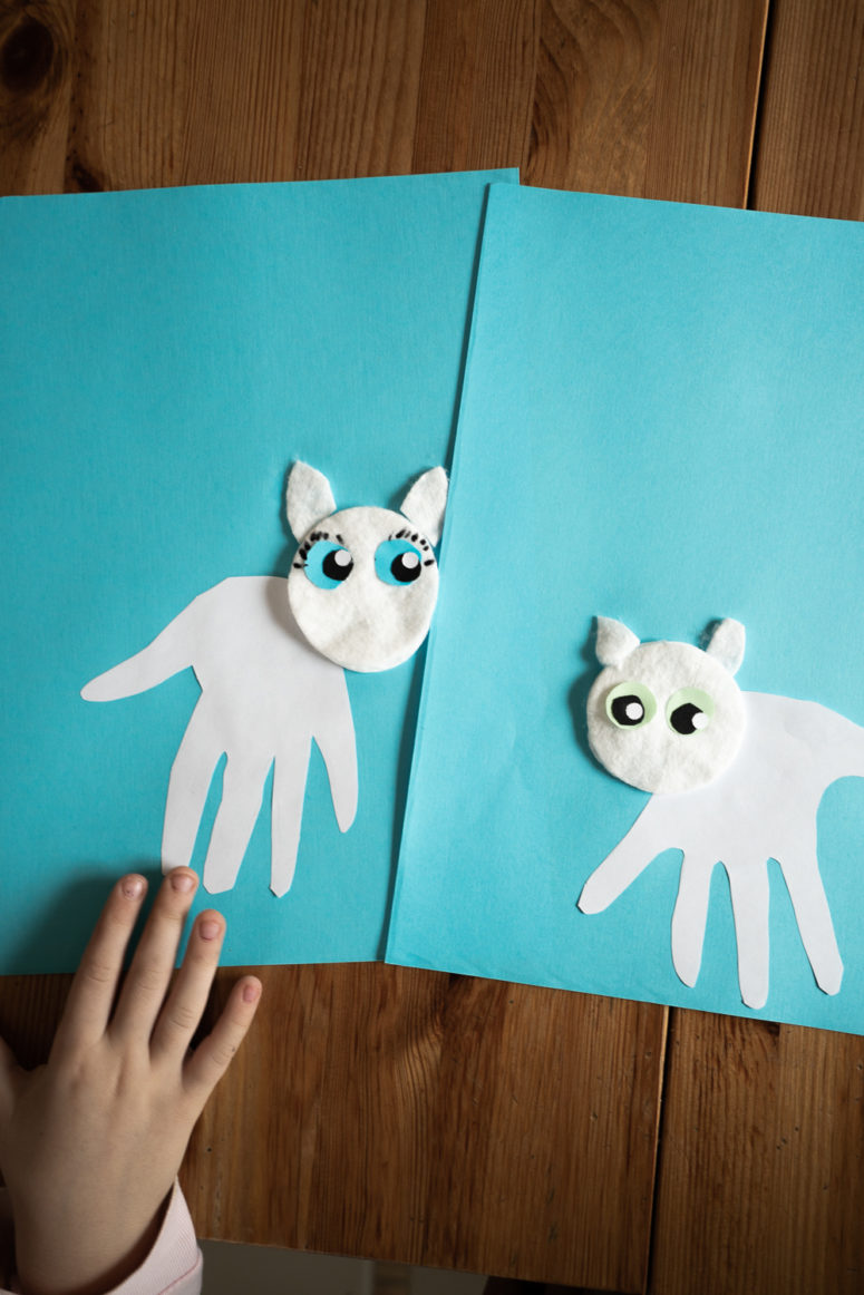 cute snow leopard handprint craft for kids