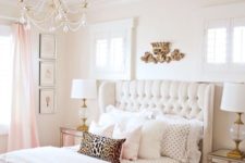 06 a chic creamy upholstered bed with a tufted wingback headboard is a welcoming and soothing piece