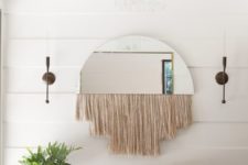 11 a half mirror with long blush fringe is a great idea to spruce up an entryway – it’s functional and decorative