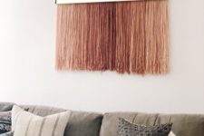 12 a half mirror with long pink fringe is a cool decoration piece for any space