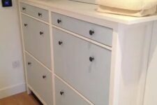 a cute IKEA Hemnes shoe storage in light blue with black knobs is ideal for a kids’ space