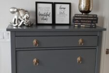 a stylish graphite grey IKEA Hemnes shoe cabinet hack with elegant vintage pulls is a lovely idea for a modern interior