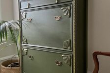 a whimsical green IKEA Hemnes shoe cabinet hack with detailing and vintage pulls for a vintage space