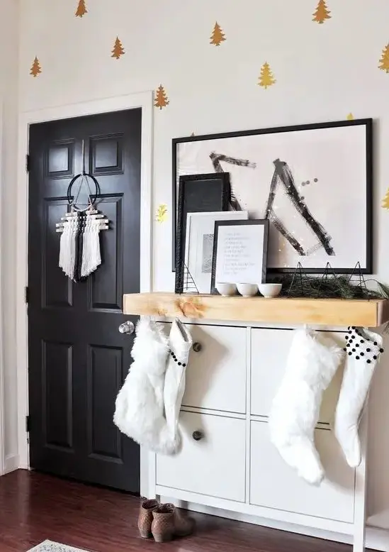 Add a mantel of light colored wood to your IKEA Hemnes shoe cabinet to make it bolder