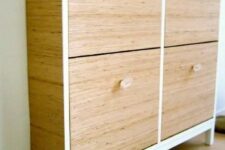 an IKEA Hemnes shoe cabinet updated with wood grain contact paper and sheer knobs for a cozy feel