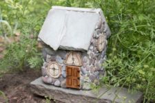 DIY cobblestone fairy house for your garden