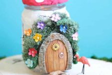 DIY mason jar fairy house with little flowers