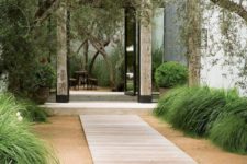 08 a minimalist wooden plank garden path will harmonize the space even more and will easily match a minimalist or Japanese space