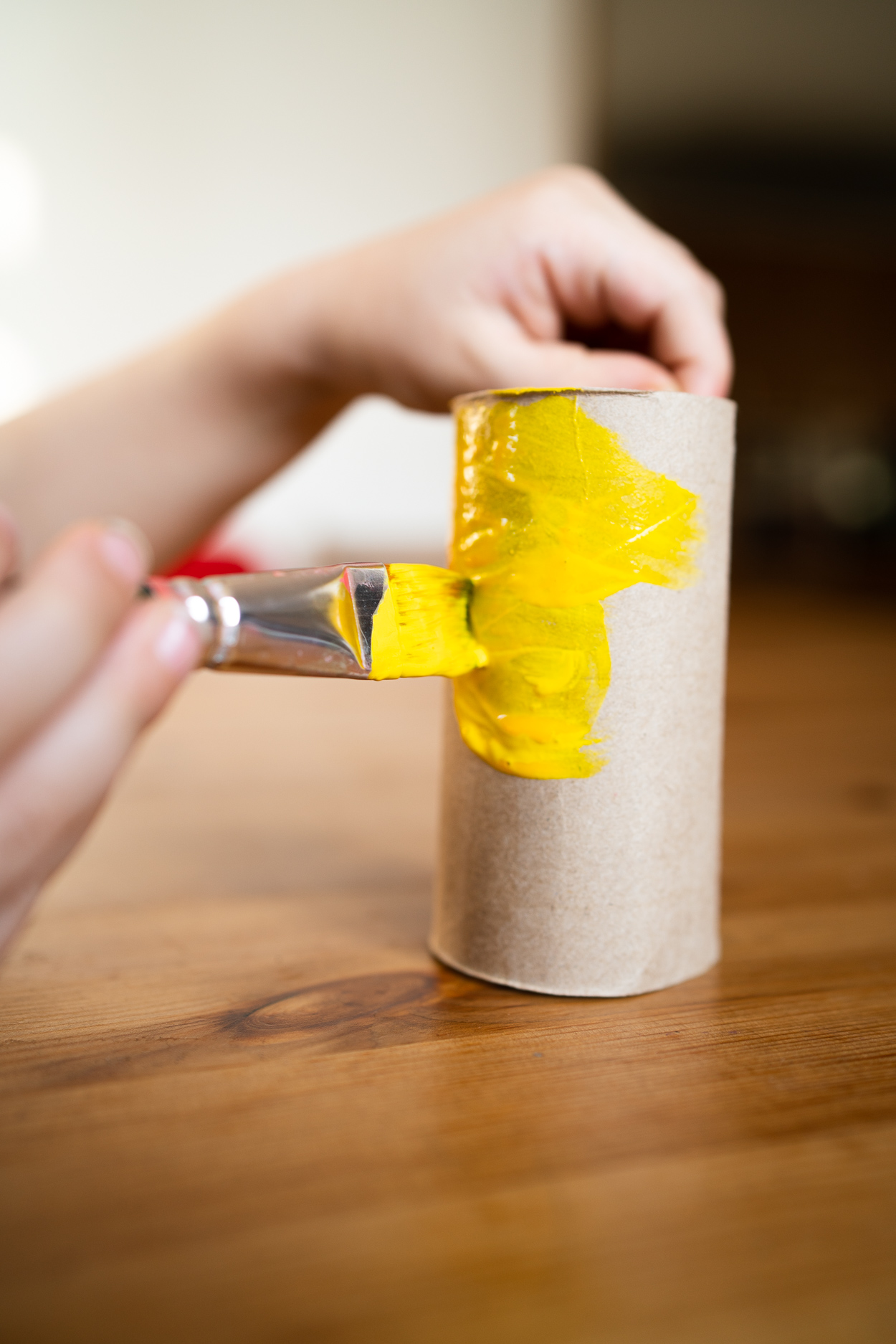 Take a toilet paper roll and paint it yellow