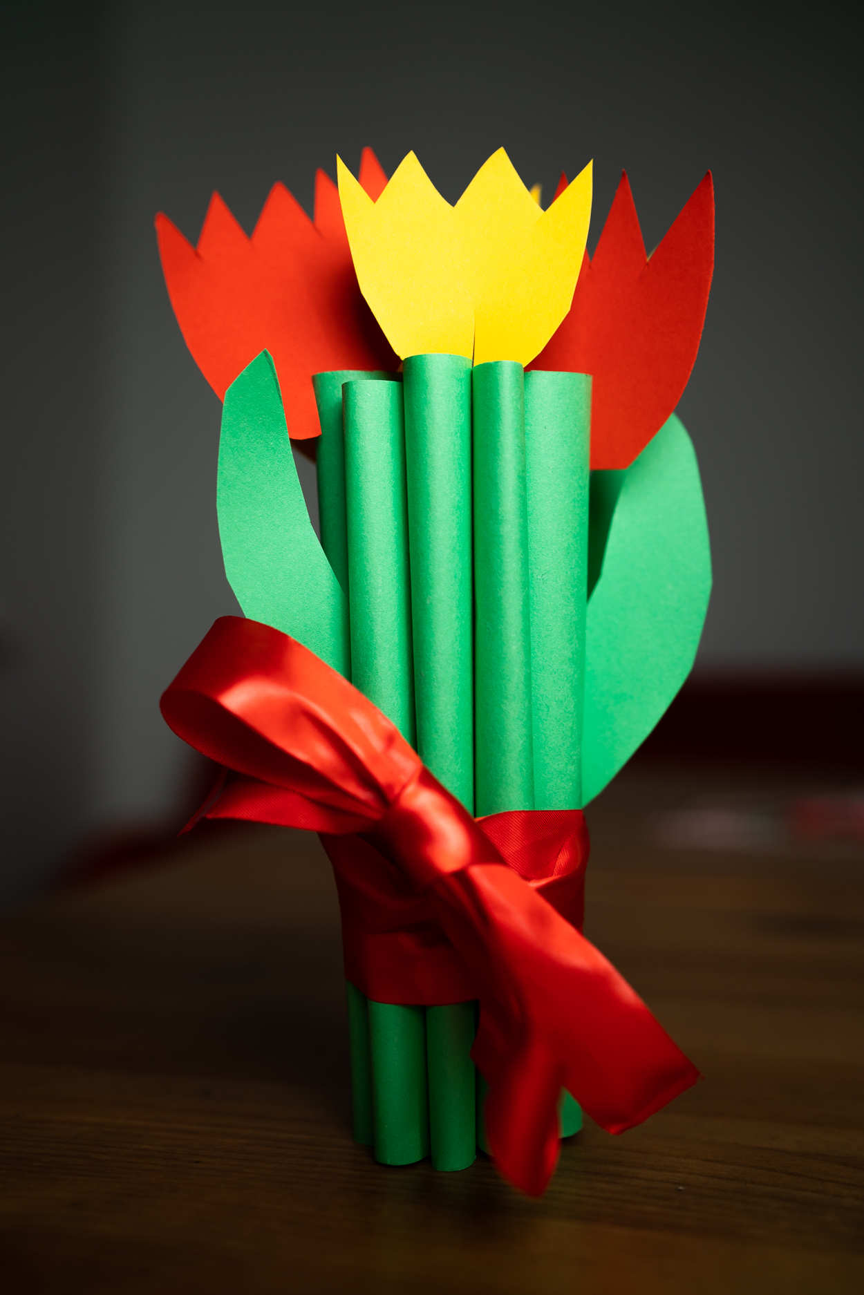 Add a red ribbon bow to the bouquet and voila!