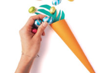 DIY carrot candy holders of colored paper for Easter