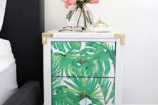 03 a cute and elegant tropical leaf nightstand with chic metallic touches is very glam