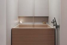 03 a square wooden bathtub for soaking will easily fit a minimalist bathroom and highlight the style