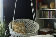 04 a bucket macrame hanging chair with tassels and fringe will add a boho feel to the space