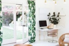 11 tropical leaf printed curtains plus gilded touches bring a glam feel to this boho chic space