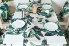 16 banana leaf print placemats and a table runner will cheer up your tablescape