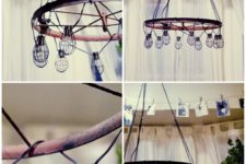 DIY industrial chandelier with bulbs and a bike wheel