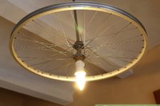 DIY simple bike wheel chandelier with a bulb