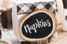 DIY wood slice chalkboard napkin holder for a rustic touch