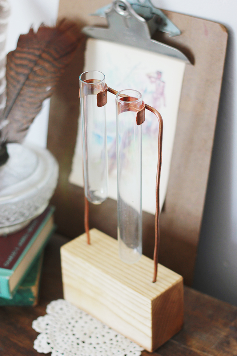 DIY copper chemist vase of wood and test tubes (via themerrythought.com)