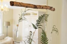 DIY hanging test tube installation for greenery or blooms