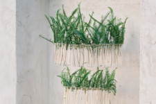 DIY test tube chandelier with greenery for a wedding or party
