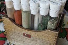 DIY pallet wood box with test tubes with spices and herbs