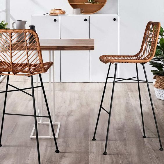 these catchy and stylish rattan stools are done with a cheveron pattern, which adds to their look
