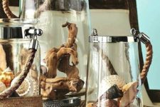 driftwood table decor in lanterns