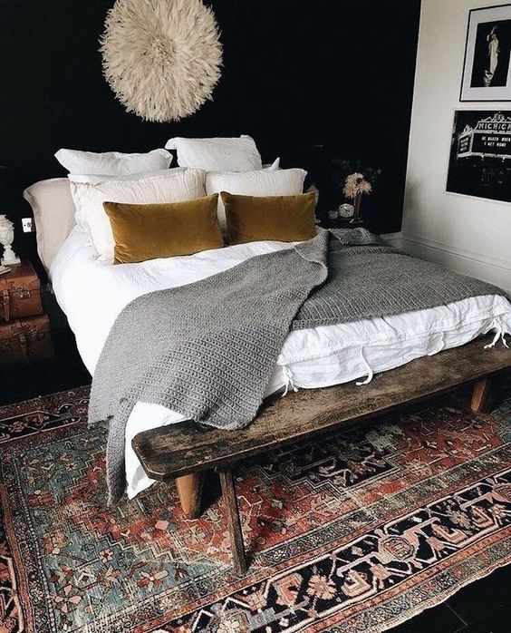 a shabby chic stained bedroom bench adds a rustic touch and a character to the sleeping space