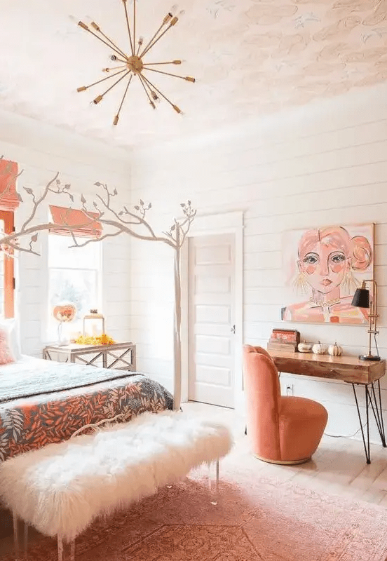 a cozy bedroom with a faux fur bench