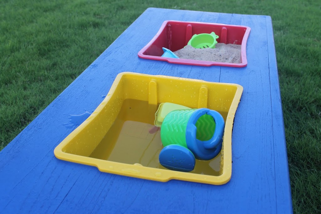 DIY sand and water table in bright and cheerful colors