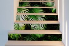 03 a laconic and even minimalist staircase with tropical leaf print decals to spruce it up for summer