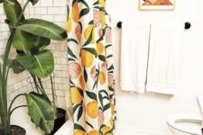 07 a citrus shower curtain and a peach rug make this bathroom summer-like and welcoming