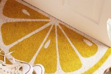 09 add a citrus rug to your entryway and it will instantly feel bright and summer-like