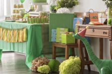 11 Dinosaur birthday themed party is all about fun and whimsy decor with various types of dino figurines