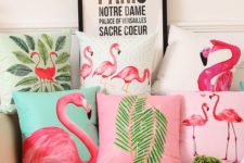 18 an arrangement of bright flamingo and tropical leaf pillows will bring a summer feel to the space