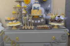Ties or Tutus is a very cute gender reveal party theme, which can be done in many colors, here in grey and yellow for a more neutral look