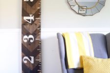 DIY rustic growth chart with white numbers