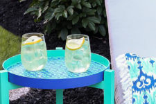 DIY stenciled outdoor end table in bright colors