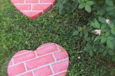 DIY concrete stepping stones imitating pink bricks
